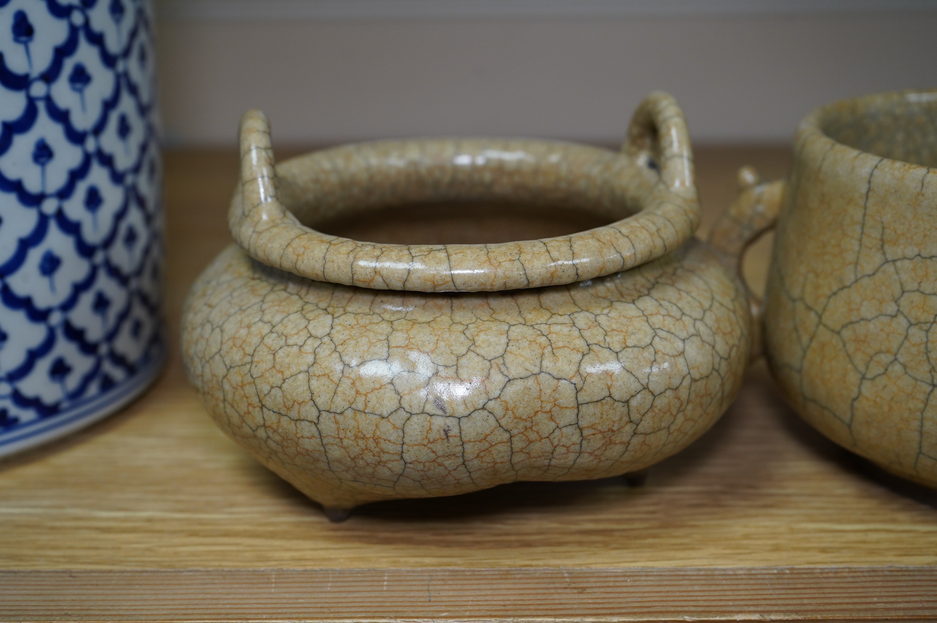 Two buff coloured crackle glazed censers including a tripod example, largest 17cm wide. Condition - good